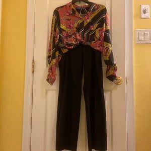 Black pants & multicolored button down blouse